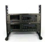 Two Alesis Adat eight track digital audio recorder units, mounted upon a rack stand, with