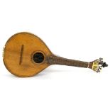 Antique Portuguese guitar probably by Antonio Duarte, bearing an indecipherable label, with scroll