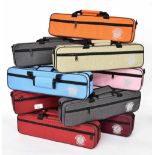 Ten various coloured flute cases (10)