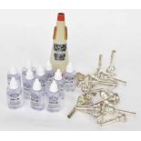 Fifteen assorted brass instrument mouthpieces, a stone lined mute and ten bottles of valve oil