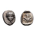 Caria, Idyma. c. 450-400 BC. Drachm, 3.75g (6h). Obv: Horned head of Pan facing. Rx: Fig leaf,