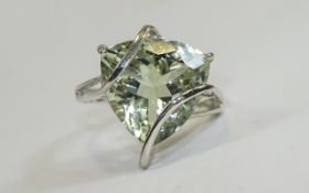 Green Amethyst Large Solitaire Ring, a 12.5ct trillion cut green amethyst set in a platinum