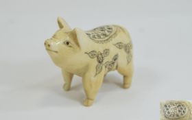 Carved Bone Pig Figure - Eastern in origin, with fine ink-work decoration.