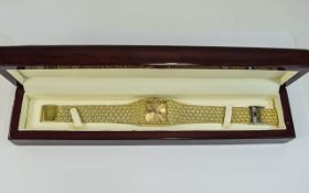 A Gents Gold Plated Rojas Working Wristwatch In a Fitted Case.