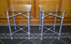 A Pair of Late 20th Century Chrome and Glass Occasional Tables. 23.