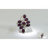 Indian Garnet Cluster Ring, red garnet with hints of blackcurrant, totalling 6.75cts set in a