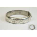 Edwardian Silver Hinged Bangle with Stylised Floral Engraving to Outer with Attached Safety Chain.