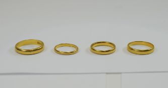 A Collection of Four Antique 22ct Gold Wedding Bands. All Fully Hallmarked. Gold Weight 15.4 grams.