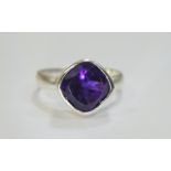 Amethyst Bezel Set Solitaire Ring, a 3.5ct, cushion cut, deep purple amethyst, bezel set in