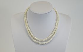 Double Strand Pearl Necklace with 9ct gold clasp.