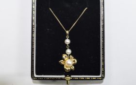 9ct Gold Cultured Pearl Pendant. Set with 3 pearls in suspended setting on a gold fine link chain.