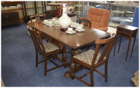 Solid Oak 1930's- 1940's Dining Table with 4 Chairs with patterned fabric seats, in good order.