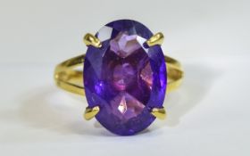 Amethyst Solitaire Ring, 11cts of rich purple amethyst in one oval cut stone, set in a simple but