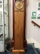 Pale Wood Grandmother Clock Pretty clock with brass dial and small ball feet, approx height 56