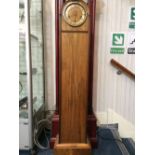 Pale Wood Grandmother Clock Pretty clock with brass dial and small ball feet, approx height 56