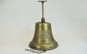 Brass Ships Bell with wall mount. Marked 'Titanic 1912'.