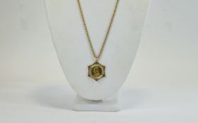 A Victorian Sovereign Set Pendant with Attached 9ct Gold Chain and Safety Chain.