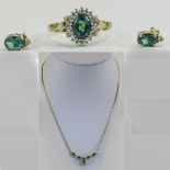 Ladies 9ct Gold Set Emerald and Diamond Matching Necklace, Earrings and Ring. Hallmarked For 9ct