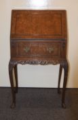 Dark Wood Writing Bureau Late 19th Century small writing desk with carved legs and apron.