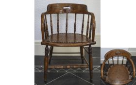 Early 20th Century Spindle Back Oak Captains Chair with Bobbin Turned Spindles Legs and Stretched