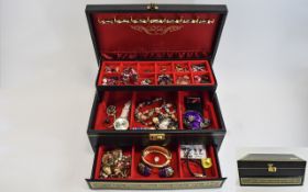 Modern Jewellery Box Containing a variety of costume jewellery including bracelets, beads,