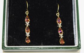 Pair Of 9ct Gold Drop Earrings Set With Three Pear Shaped Topaz Between Diamond Chips,