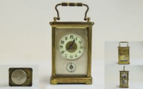 English Late 19th Century Brass Carriage Clock with Alarm, And Two Porcelain Dials,