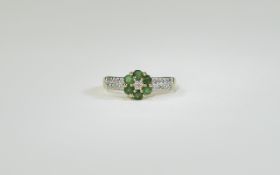 9ct Gold Cluster Ring set with emeralds and diamonds. Fully hallmarked.