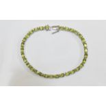 Peridot Tennis Bracelet, 16.25cts of ova