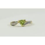 9ct Gold Ring set with a central pear cu