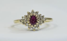 9ct Gold Ruby Cluster Ring set with a ce