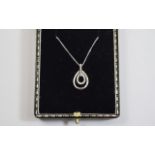 9ct White Gold Diamond Pendant & Chain.