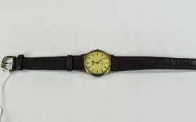 A Gents Gold Colour Wristwatch on a Brow