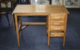 Golden Oak Office Table Early 20th Century table with brush slide above 4 short drawers and drop