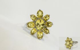 Canary Yellow Aquamarine Flower Ring, an oval cut of 1.