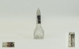 1930's Silver Banded Cut Glass Scent Bottle. Hallmark Birmingham 1931. Height 5.5 Inches.