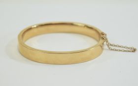 Victorian 15ct Rose Gold Hinged Bangle with Attached 15ct Gold Safety Chain. Marked 15 ct. 16.