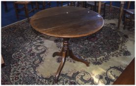 Tripod Table Early 19th Century Elm table. Approx dimensions 29.