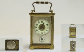 English Late 19th Century Brass Carriage Clock with Alarm, And Two Porcelain Dials, One For The