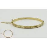 Ladies 9ct Gold Hinged Bangle with Safety Chain and with Chased and Diamond Cut Decoration. 6.