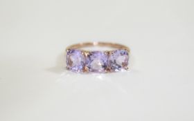 Rose de France Amethyst Three Stone Ring, three cushion cut Rose de France amethysts totalling 4cts,