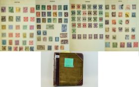 Wonderful old loose leaf stamp album reasonably full of all world stamps - mostly old.