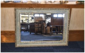 Large Rectangular Mirror With contemporary verdigris and gilt wooden frame. Approx dimensions 36.
