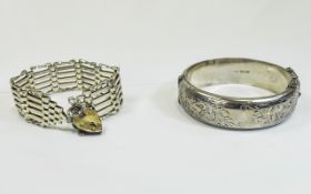 Silver Hinged Bangle with Stylish Floral Decoration. Hallmarked for Birmingham 1963, 41.