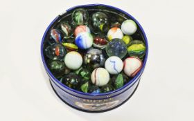 Tin of marbles