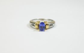 14ct White Gold Set Tanzanite and Diamond Ring, The Faceted Tanzanite of Good Colour. Marked 14ct.