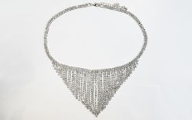 White Crystal Fringe Necklace, the fringe, comprising individual vertical rows of white crystals,