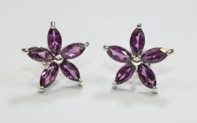 Pair of Rhodolite Garnet Flower Stud Earrings, five marquise cut rhodolite garnets to each flower,