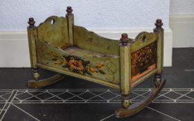 Decorative Wooden Cradle Child's rocking cradle finished in distressed green paint with folk style