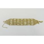 Ladies 9ct Gold Nine Bar Gate Bracelet. c.1980's. Fully Hallmarked, 9.375. Excellent Condition. 27.